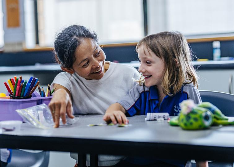 Teacher at Bairnsdale Christian College nurturing a student in a Christ-centred environment, reflecting God’s unconditional love and creating a sense of belonging and security.